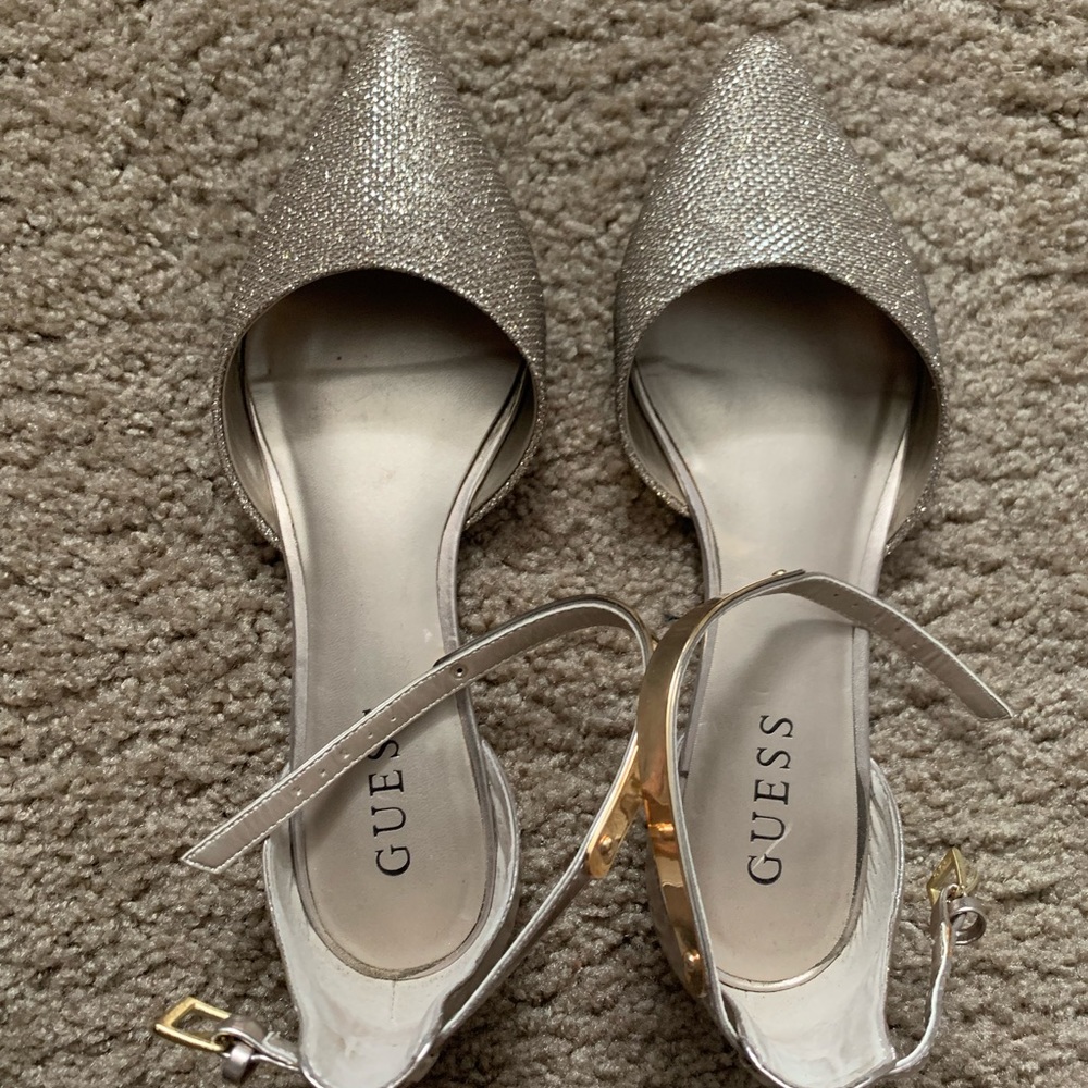 Guess size 7.5 gold and silver flats. Perfect for special occasions. Worn once.